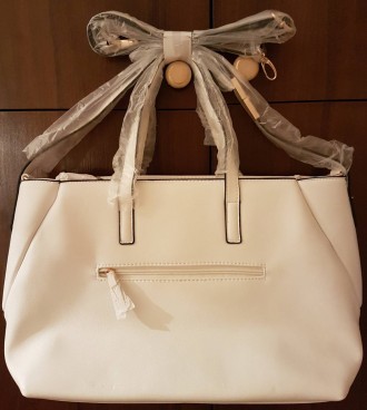 Продам новую стильную сумку из экокожи Carpisa (Италия). Привезена из Милана. 
. . фото 3