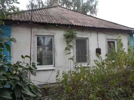 Продам дом в городе Краснодон ул.Тюленина 15 мин.до кв.Лютикова. 3 жилые комнаты. . фото 3