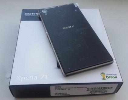 Sony Xperia Z1 (C6902) черный новый в наличии + силиконовый чехол бампер + защит. . фото 4