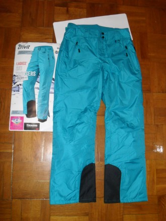 Новые ( в упаковке ) стильные бирюзовые женские брюки Crivit из мембранной ткани. . фото 2