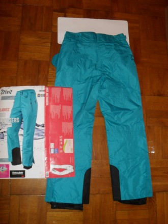 Новые ( в упаковке ) стильные бирюзовые женские брюки Crivit из мембранной ткани. . фото 7