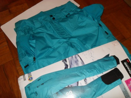 Новые ( в упаковке ) стильные бирюзовые женские брюки Crivit из мембранной ткани. . фото 4
