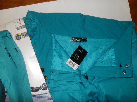 Новые ( в упаковке ) стильные бирюзовые женские брюки Crivit из мембранной ткани. . фото 3