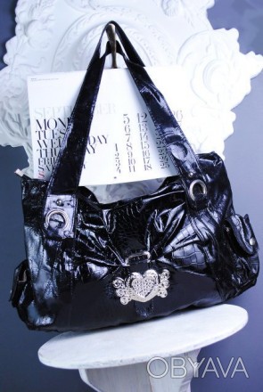 Очень стильная сумка, можно носить как в руке так и на плече
Вместительная и кр. . фото 1