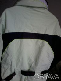 Женская лыжная куртка ATOMIC, размер S, внутри, снаружи и на рукаве имеются карм. . фото 4