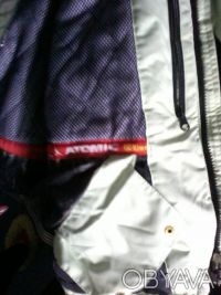 Женская лыжная куртка ATOMIC, размер S, внутри, снаружи и на рукаве имеются карм. . фото 6