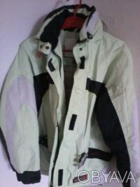 Женская лыжная куртка ATOMIC, размер S, внутри, снаружи и на рукаве имеются карм. . фото 3