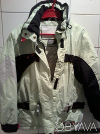 Женская лыжная куртка ATOMIC, размер S, внутри, снаружи и на рукаве имеются карм. . фото 2