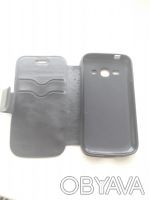 Продам чехол черного цвета для телефона  Samsung Galaxy ACE 3.7272. . фото 2