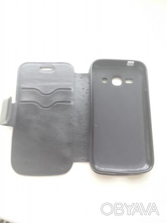 Продам чехол черного цвета для телефона  Samsung Galaxy ACE 3.7272. . фото 1