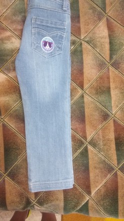Красивые джинсы для девочки голубого цвета . Размер 104 см. Состояние идеальное.. . фото 9