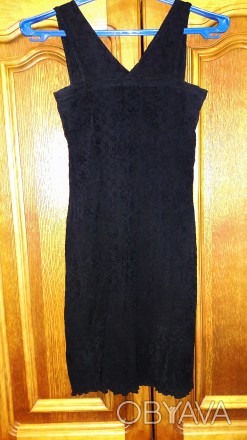 Продам дешево женское черное платьице в обтяжку на шелковой подкладке. Прекрасно. . фото 1