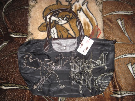 Новая с этикеткой - очень удобная и компактная раскладная сумочка, черного цвета. . фото 2