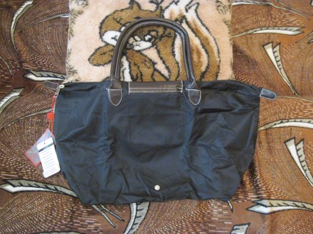 Новая с этикеткой - очень удобная и компактная раскладная сумочка, черного цвета. . фото 3