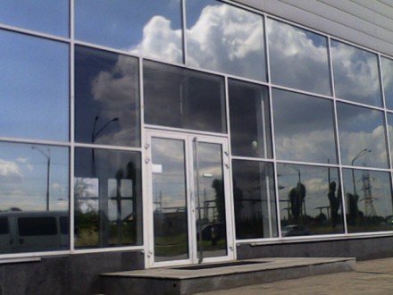 Тонировка солнцезащитной пленкой в Днепропетровске стеклопакетов окон офисов, са. . фото 2