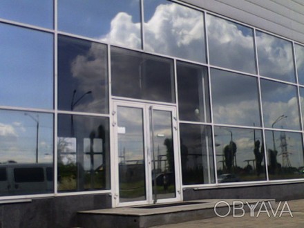 Тонировка солнцезащитной пленкой в Днепропетровске стеклопакетов окон офисов, са. . фото 1