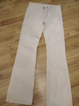 Продам джинсы с вышивкой в новом состоянии.. . фото 2