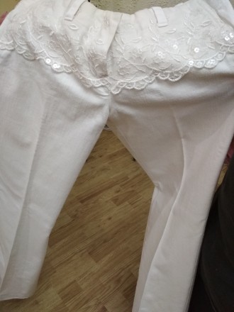 Продам очень красивые брюки , декорированные кружевом в новом состоянии.. . фото 4