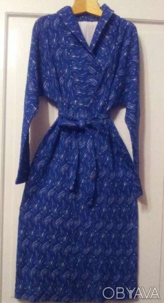 Трикотажное платье из шерсти с вискозой голубого цвета с рисунком.
Состояние - . . фото 1