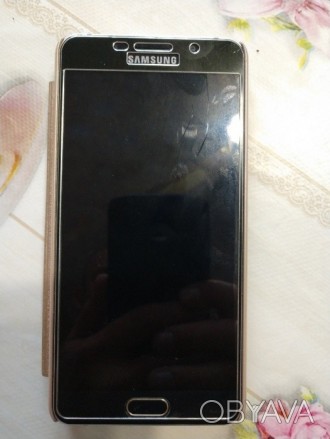 Samsung Galaxy А7 (2016) GOLD был куплен в 2016 году за 11999,00 грн. в магазине. . фото 1