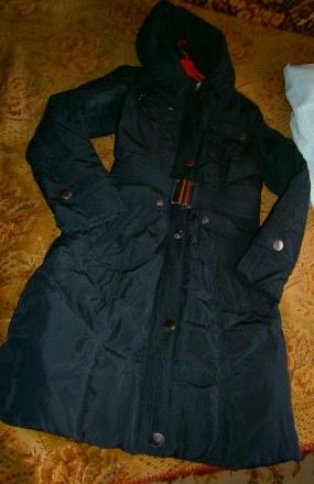 Продам легкое теплое  красивое пальто черного цвета  48размер. 70%-пух, 30%-перо. . фото 4