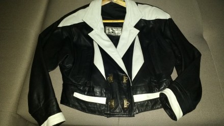 Продам женскую кожаную куртку, доина - до талии, черного цвета с белыми вставкам. . фото 8