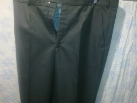 Продам новые школьные брюки черного цвета размером 48-50, рост 3, из прочной и к. . фото 2