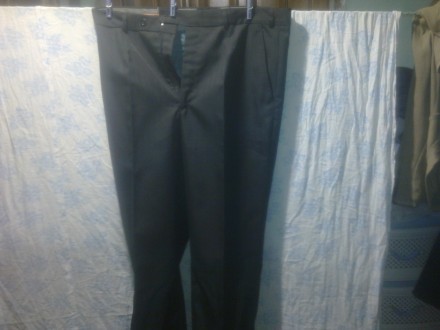 Продам новые школьные брюки черного цвета размером 48-50, рост 3, из прочной и к. . фото 3
