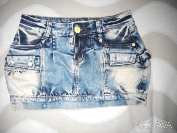 Продам короткую джинсовую юбку,размер 27, длина 29 см, ПО талии 36 см, ПО бедер . . фото 1
