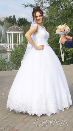Продам очень красивое свадебное платье в отличном состоянии. Размер 44, регулиру. . фото 1