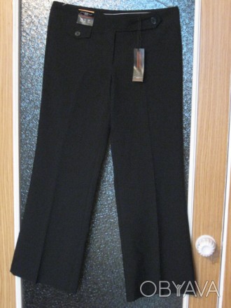 Продам женские новые брюки. Цвет  черный. Материал полиэстер. Состояние - новые . . фото 1