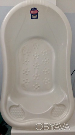 Ванночка молочного цвета с пупырчатым дном и сливом. Есть два углубления для ван. . фото 1