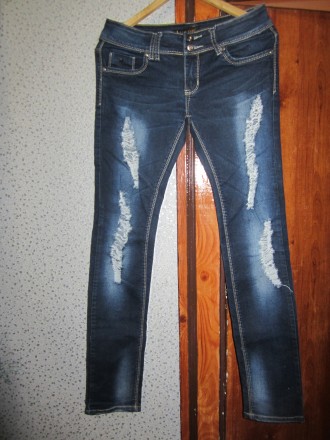 Крутые,фирменные рваные джинсы.Б/у 2 раза(носить не могу-спадают,поэтому просто . . фото 2