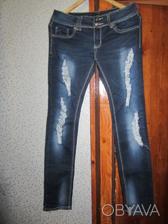 Крутые,фирменные рваные джинсы.Б/у 2 раза(носить не могу-спадают,поэтому просто . . фото 1