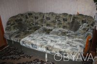 Продам роскошный угловой диван для гостиной , раскладной , имеет отдел для одеял. . фото 2