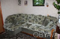 Продам роскошный угловой диван для гостиной , раскладной , имеет отдел для одеял. . фото 4