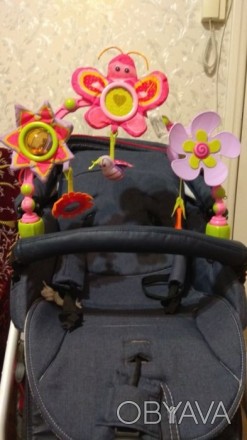 Крошка Бетти Tiny Love — забавная разноцветная развивающая гибкая дуга на коляск. . фото 1