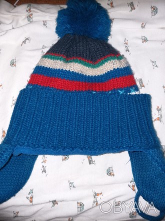 Продам теплые зимние шапки голубая 18-24 в хорошем состоянии зеленая 2-3 новая. . фото 1