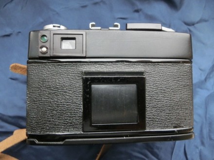 Эле́ктра-112 — советский малоформатный автоматический дальномерный фотоаппарат п. . фото 4
