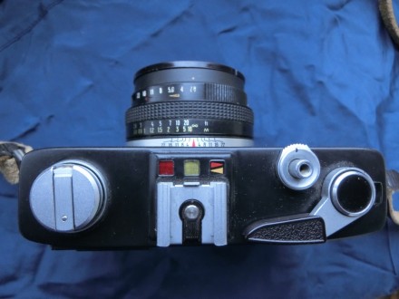 Эле́ктра-112 — советский малоформатный автоматический дальномерный фотоаппарат п. . фото 5