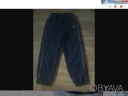 Продам спорт. штаны темно-синего цв., UMBRO, рост 152 см. Верх на резинке, низ ш. . фото 1