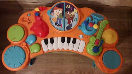 Іграшка виконана у вигляді столика, на якому розташовані клавіші піаніно і ще сі. . фото 3