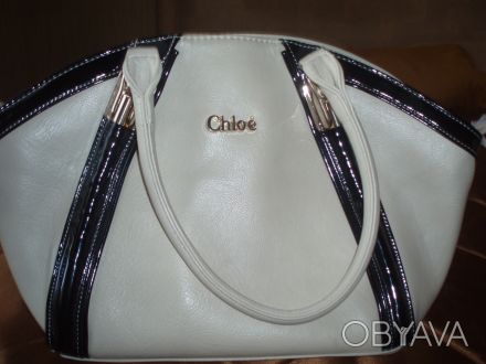 Симпатичная сумочка для модницы в форме трапеции бежевого цвета (хотя цвет может. . фото 1