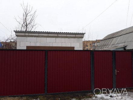 Продам гараж з присадибною ділянкою котрий знаходиться в центрі Бородянки по вул. Бородянка. фото 1