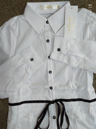 Красивые и качественные   белые блузки   для девочек фирмы DELORAS.
Состав : 76. . фото 7