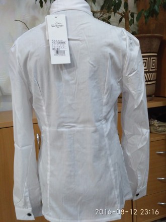 Красивые и качественные   белые блузки   для девочек фирмы DELORAS.
Состав : 76. . фото 4