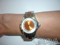 Продам новые женские наручные часы двухцветные,серебряно-золотистого цвета.Диаме. . фото 7