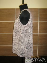 Практичная и удобная блузка без рукавов из шелка нежной расцветки.
Практически . . фото 3