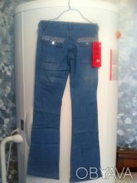 Модные голубые джинсы с красивой отделкой . 

Размерный ряд: 25, 28, 29, 30.
. . фото 4