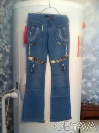 Модные голубые джинсы с красивой отделкой . 

Размерный ряд: 25, 28, 29, 30.
. . фото 2